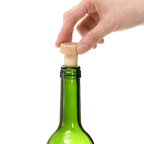 Hand using 60 Pieces T Shaped Wine Corks Reusable Cork Plugs Wooden And Rubber Wine Stoppers For Wine Beer And DIY Crafts Sealing Bottles