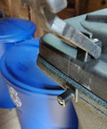 Two Pack Flexible Rubber T Handle Draw Latches With Shock Absorption on black surface, shown against blue lids