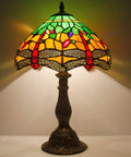 Green And Yellow Stained Glass Tiffany Dragonfly Table Lamp For Bedside And Desk Use, featuring vibrant stained glass dragonflies.