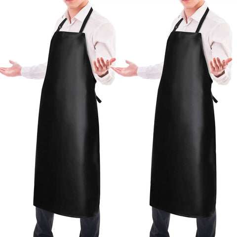 Two men wearing 2 Pack Waterproof Rubber Vinyl Aprons For Men Heavy Duty Kitchen And Grilling Aprons Extra Long 40 Inch Bib Aprons With Adjustable Neck Strap Chemical Resistant Ideal For Dishwashing Lab Butchering Cooking Black.