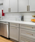 Kitchen with Six Pack Of 5 Inch Champagne Bronze Knurled Cabinet Pulls For Drawers And Dressers With No Slip Grip And Industrial Chic Style From Goo-Ki, Durable Textured Diamond Knurl Hardware installed.
