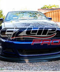 Front view of a car with Front Splitter Pro Universal 2 Inch Lip Spoiler For Cars, Black, showing aggressive and protective styling.