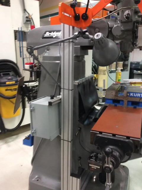 Interlocked Floor Mount Milling Guard Shield With Quarter Inch Lexan Window Built Tough OSHA Compliant Safety Barrier shown in workshop