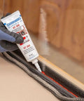 Applying Heavy Duty High Temp Silicone Sealant For Sealing Bonding And Insulating Withstand Up To 572 Fahrenheit Red For Oven Chimney Adhesive In Home And Industrial Use Two Point Eight Ounce to a glass edge.