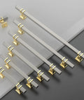 10 Pack 5 Inch Brushed Satin Nickel And Gold Cabinet Handles Set, showcasing two tone finish, arranged on a surface