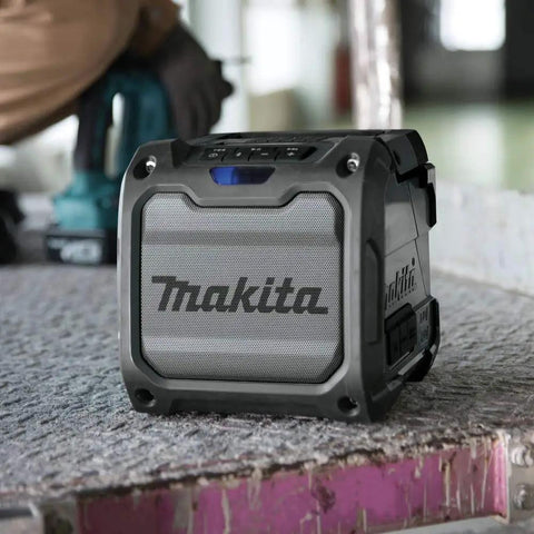 Cordless Job Site Bluetooth Speaker For Power Tools 18V LXT And 12V Max CXT showing rugged design on construction site