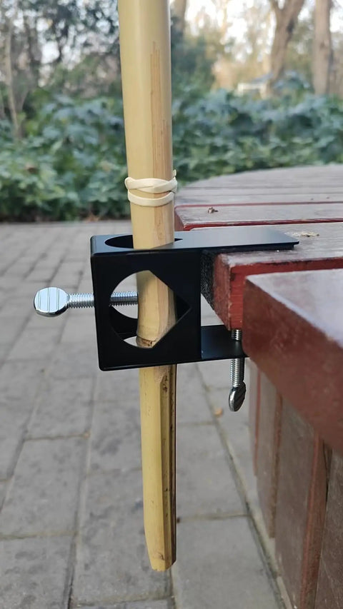 Go To Pole Holder Deck Mount Clamp Set For Tiki Torches And Mounting Poles On Porch Table Deck Or Fence Four Pack Heavy Duty Outdoor Clips For Lighting Bird Feeders And Flags installed on outdoor bench holding pole securely