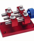 Beefy Aluminum Work Holder With Anodized Red Finish And Knurled Blue Adjustment Knob A Solid Workshop Tool For Securely Holding Parts And Precise Repairs Heavy Duty Aluminum Alloy Build For Everyday Shop Use., red aluminum work holder with blue knob and mounting holes
