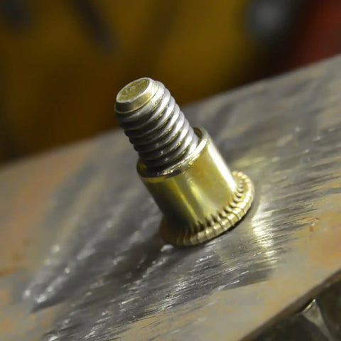 Close-up of galvanized carbon steel threaded insert from 500 Piece Rivet Nut Kit Carbon Steel Threaded Inserts Galvanized Set For Furniture Assembly
