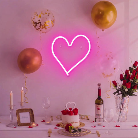 Pink Heart Neon Sign LED Light Up Wall Decor For Bedroom And Valentines Day Romance above a romantic dinner table