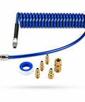 Bad Ass Polyurethane 15 Ft Coiled Air Hose Kit With One Quarter Inch NPT Fittings Made In Canada For Superior Cold Weather Flexibility Lightweight Design Keeps It Tangle Free Easy Roll And Handle In Busy Garage Or Shop Ensures Strong Air For Tools. Blue 15 ft coiled polyurethane air hose with 1/4 inch fittings and adapters