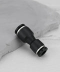Side view of a black 20 Pack 6mm to 8mm Black Straight Reducer Push to Connect Pneumatic Fitting with Quick Release.