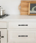 10 Pack 5 Inch Matte Black Cabinet Handles Zinc Alloy Drawer Pulls installed on white kitchen cabinets