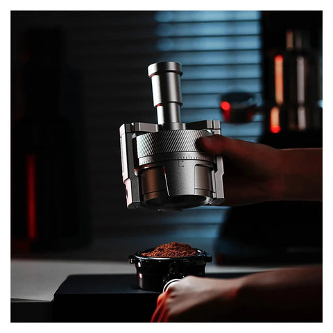 Top Shelf Espresso Needle Wdt Tool For 58mm Portafilter Black Coffee Ground Stirrer in use over ground coffee.