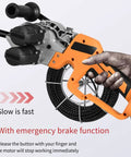 Cordless Brushless Electric Wire Puller 800W With 21V 4000mAh Battery showing hand gripping handle with control buttons.