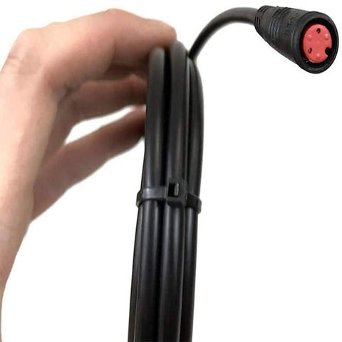 Hand holding waterproof 1 to 5 electric bicycle cable for e bike KT controller with display throttle ebrake headlight wiring kit 156cm