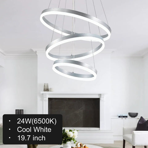 Dimmable 3 Ring LED Chandelier Pendant Light With Height Adjustable Dope Modern Silver Finish, ETL Certified Flush Mount Acrylic Ceiling Fixture For Dining Room Living Room Bedroom Foyer, 6000K Daylight, hanging in a living room setting.