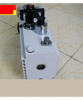 Straight Up Built Tough Two Stage Rotary Vane Vacuum Pump With Direct Coupled Motor And Gas Ballast Valve top view showing design and components.