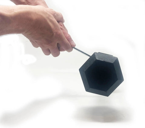 Hand holding Ultimate Hand Held Magnetic Pickup Tool For Gold Prospecting And Black Sand Separation With Five Strong Magnets To Filter Pay Dirt Fast And Isolate Gold From Concentrates Effortlessly In Your Panning Kit.