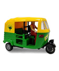Ace Handcrafted Miniature Auto Rickshaw Desk Model Sporting Vivid Yellow And Green Finish As A Vintage Tuk Tuk Collectible Showpiece for shelf display.