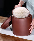 Heavy Hitter Ceramic Rice Jar Round With No Sweat Seal, Retro Large Capacity Airtight Grain Bucket holding rice.