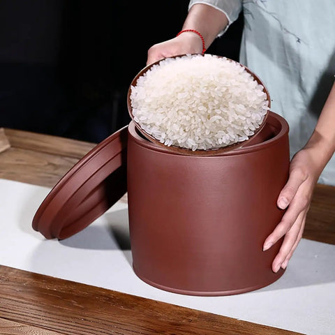 Heavy Hitter Ceramic Rice Jar Round With No Sweat Seal, Retro Large Capacity Airtight Grain Bucket holding rice.