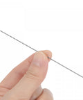 Hand holding a Handy 0.9mm Mini Micro Twist Drill Bit, extra long 100mm HSS, precision tool for aluminum alloy projects