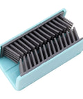 Reusable Silicone Hair Catcher Avoid Clogging Bathtub Drain in teal and gray, designed to trap hair in the shower.