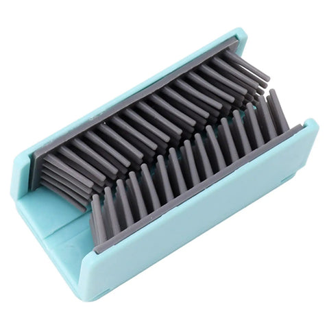Reusable Silicone Hair Catcher Drain Protector with gray bristles, wall mounted design, compact for shower and bathtub use.