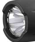 Close-up of the lens of Beast Mode Rechargeable LED Spotlight Flashlight With Pistol Grip Waterproof Submersible Floats Face Up