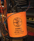 Bright Orange Vinyl Tool Bucket With Swivel Snap And Web Handle 12 Inch Diameter 100 Pound Load Rating Water Resistant Lineman Bucket For Electricians Who Hustle Durable Carry Handle Keeps Tools Secure And Easy To Grab in workshop setting