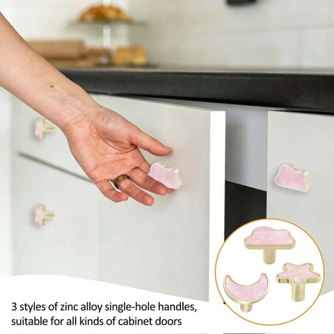 Decorative Pink Cloud Moon Star Cabinet Knobs Set, 6 Pack Zinc Alloy Knobs on white cabinet drawers being installed