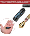 Hand holding ABBREE 805S GMRS antenna beside its copper and black parts, enhancing communication range
