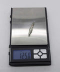 Stainless Steel Screw In Archery Field Points 12 Pack With Silicone Rings on scale showing 125 grain weight