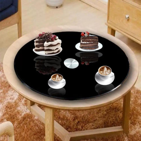 Heavy Duty 40 Inch Black Tempered GlassLazy Susan Turntable with desserts and coffees on a stylish table.