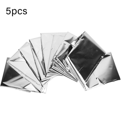 Five folded silver Emergency Survival Blanket Reflective Thermal Rescue Gear for Outdoor Camping and Hiking Waterproof Lifesaver Signal Blanket