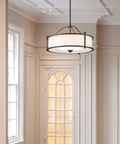 Dark Bronze 18 Inch 3 Light Drum Pendant with Fabric Shade and Glass Diffuser in elegant living room setting
