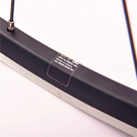 Close-up of Ultra Light Carbon Wheelset For Road Racing 700C Front 100mm Rear 130mm V Brake Quick Release, rim detail.