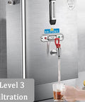 No Fuss Commercial Hot Water Boiler And 40L Stainless Steel Dispenser With 3Kw Fast Heat Element Auto Refill System Plus Digital Thermometer And Anti Dry Burn Safety For Cafe Or Office Daily Grind pouring water into a cup.