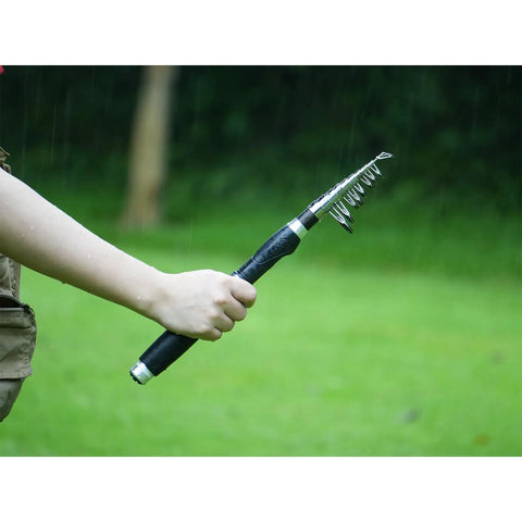 Person holding Telescopic Fishing Rod And Reel Combo 6.9 Foot 2 Piece Set With Carrier Bag Carbon Fiber Spinning Rod for Freshwater Angling