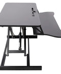 31.5 Inch Height Adjustable Standing Desk Converter Featuring Ergonomic Keyboard Tray And Monitor Riser side view showing sturdy design.