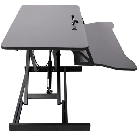 31.5 Inch Height Adjustable Standing Desk Converter Featuring Ergonomic Keyboard Tray And Monitor Riser side view showing sturdy design.