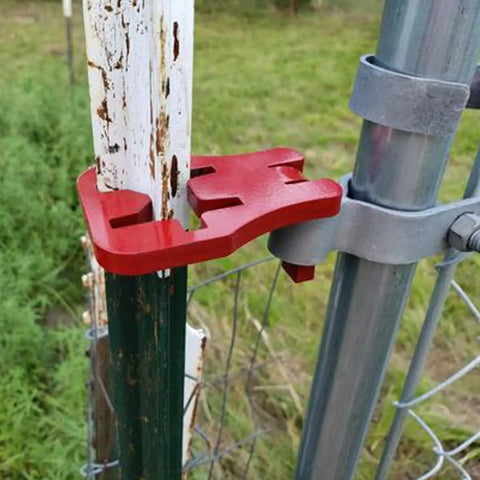 Rugged T-Post Gate Hinge Pins Set For Farm And Garden Gates mounted on metal T-post showing red powder-coated finish.