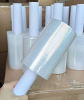 Top Shelf Clear Stretch Wrap 6 Inch By 1000 Feet Plastic Roll for Moving and Shipping, stacked rolls for heavy duty packing.