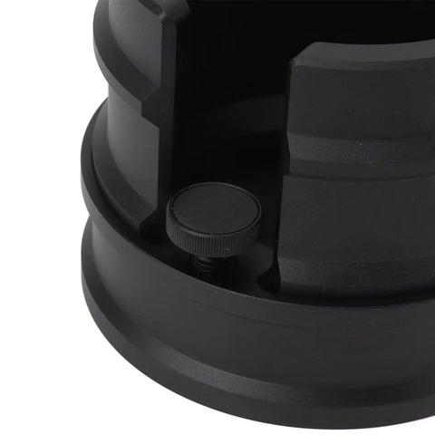 Close-up of Premium Aluminum Coffee Portafilter Holder And Tamper Station, featuring a black finish and adjustable base.