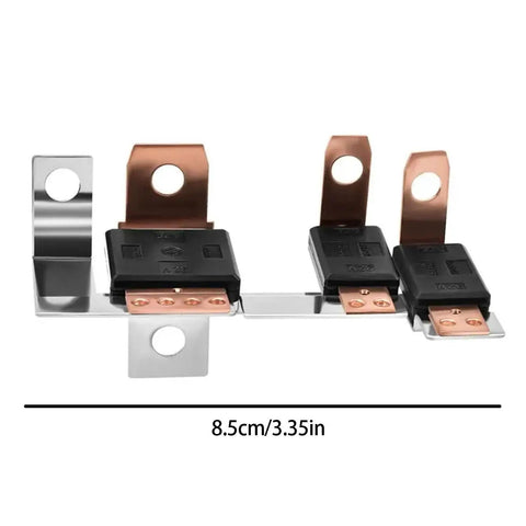 Solid Vehicle Electrical Link Unit With Molded Housing And Metal Tabs Serving As A Perfect Replacement For Your Battery Main Connection Let It Fix Your Ride Today. Close-up view of electrical link unit with molded housing and metal tabs, 8.5 cm long.