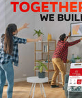 Hella Heavy Duty Drywall Anchors And Screws Kit 20 Pack used by two people to mount decor on wall.