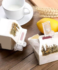 Premium Set Of 10 Transparent Milk Carton Lid Clips For Bags, Reusable Sealers To Keep Food Fresh Longer, Durable Kitchen Organization Tools For Pantry And Fridge Storage placed on a wooden table.