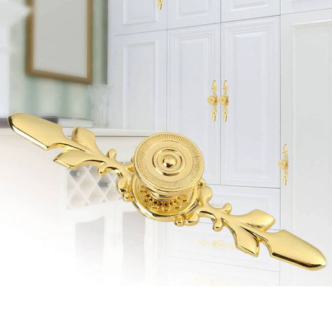 Front view of Vintage Pull Handle Door Knob Back Plate for cabinets, dressers, golden zinc alloy, 120mm length, installed on cabinet