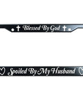 Blessed By God Spoiled By My Husband black metal license plate frame with two holes and humor quote, heart and cross icons